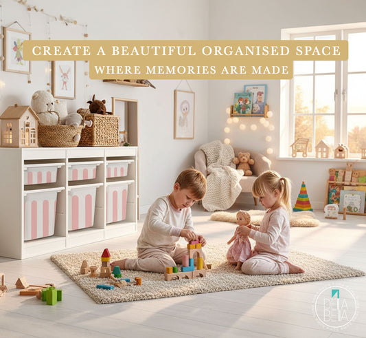 Children playing in a bright, organised playroom with toys and trofast ikea furniture.