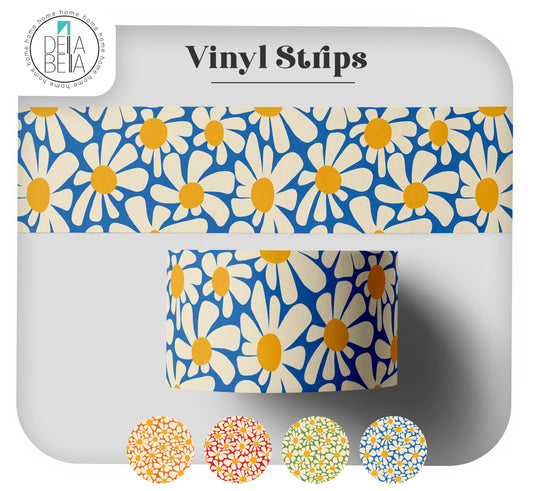 Roll of Della Bella groovy floral peel and stick vinyl strip featuring a 70s retro orange, yellow, and white daisy pattern. Used for renter-friendly dopamine decor and door edging.