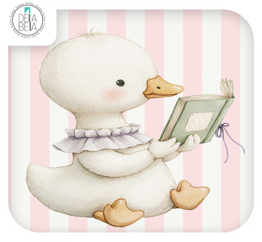 Ikea hack stickers  featuring an illustration of a white duck sitting and holding a green book against a pink and white striped background. A circular Della Bella logo appears in the top-left corner.