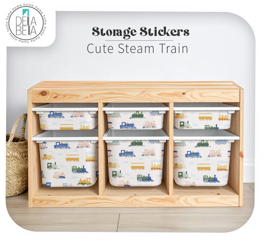 trofast Wooden storage unit with train-themed bins and 'Dela Bella' branding.