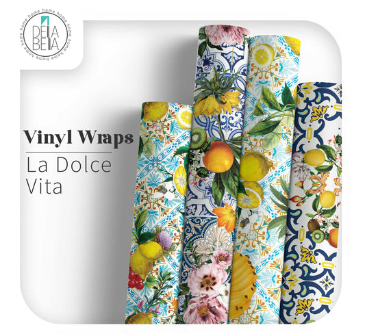 Set of vinyl wraps with fruit and floral patterns on a white background, branded 'Dela Bella'.