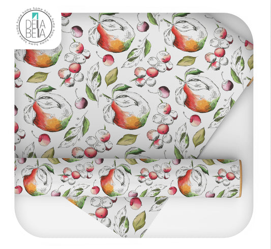 Patterned fabric with fruit design on a white background, featuring the Dela Bella brand.