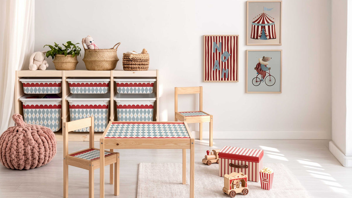 Kids room with IKEA Trofast storage unit featuring Della Bella checkered vinyl stickers, wooden table and chairs with matching vinyl, and playful wall art