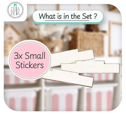 Small white stickers with text overlay on a blurred background