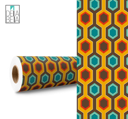 A roll of vinyl wrap featuring a geometric pattern with hexagons in orange, yellow, and blue shades on a white background.