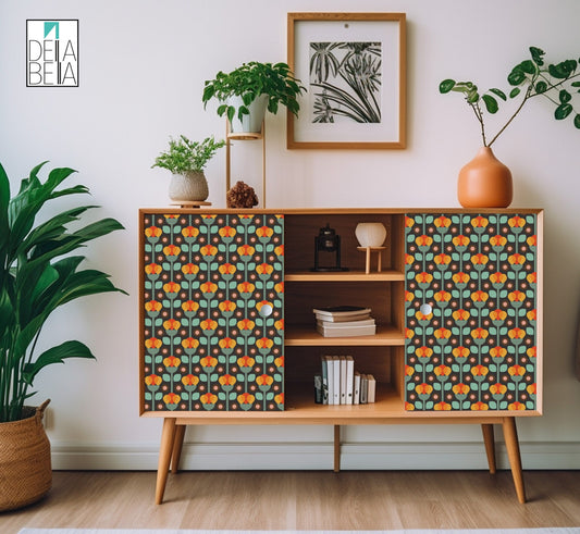 A vinyl wrap with a boho geometric floral pattern applied to a wooden furniture cabinet, enhancing its mid-century vintage aesthetic.