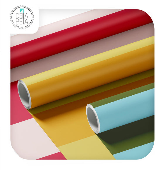 Rolls of vinyl wrapping in various colors including red, yellow, green, and blue, designed for use in home decor and furniture transformation.