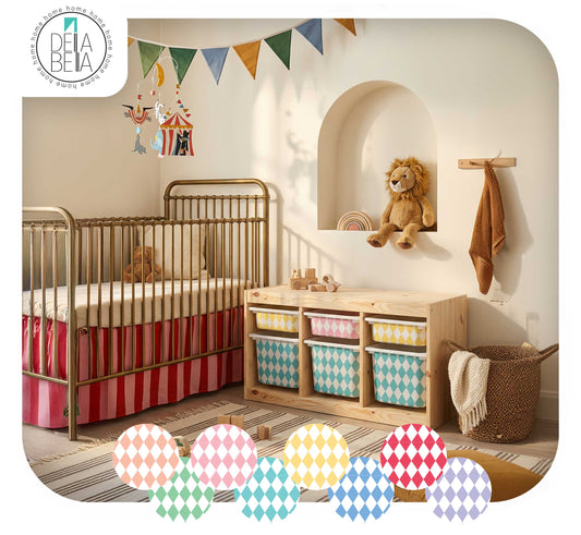 Children's room with a crib, trofast storage unit with stickers, and decorative elements.